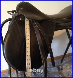 Black 18 inch Dressage Saddle With Padded Knee Rolls, Girth, Stirrups, & Leathers
