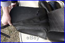 Black Dominus dressage saddle with leather girth, stirrups & stirrup leathers