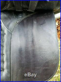 Leather is in beautiful condition and comes complete with girth, irons, & cover