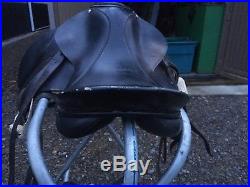 Non branded 17 dressage saddle with 2 pads, 32 girth, irons and leathers