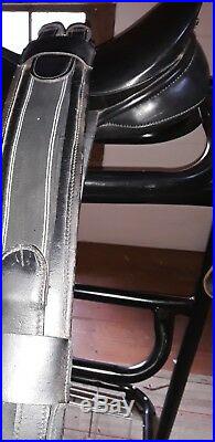 Rembrandt dressage saddle with girth, stirrup leathers and two saddle pads